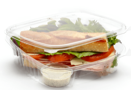clear hinge container with sandwich and dip container inside
