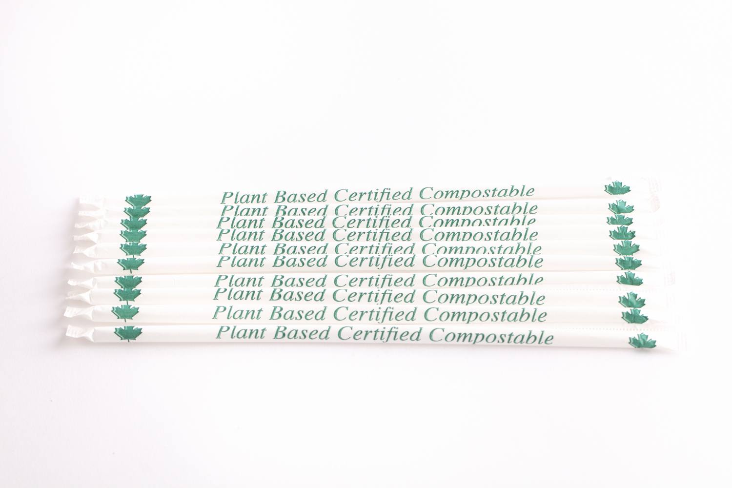 row of wrapped straws showing plant based certified compostable label