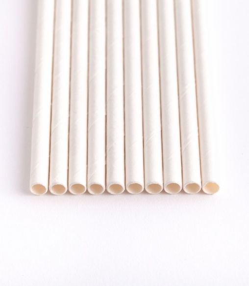 line of white paper straws