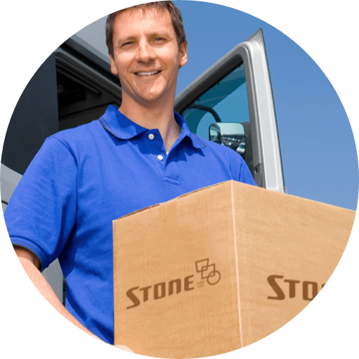 smiling worker carrying box with stone logo